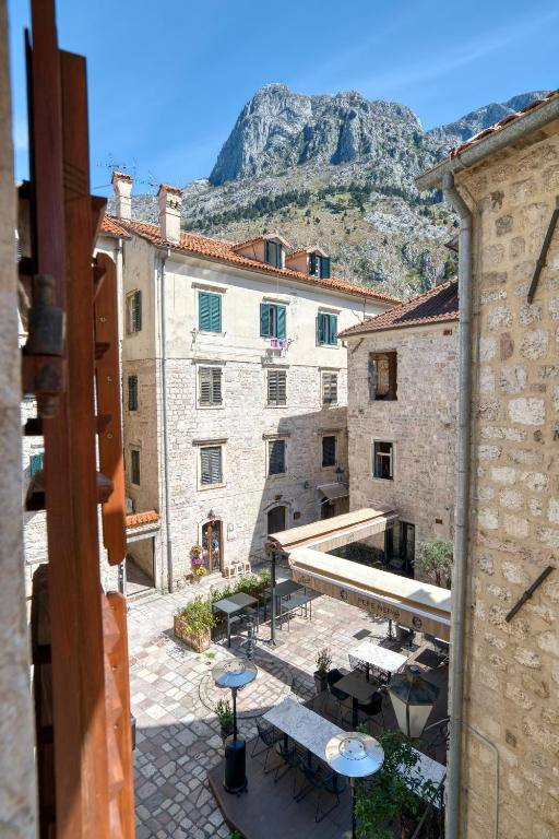 Balcony view of Kotor Old Town and the mountains
